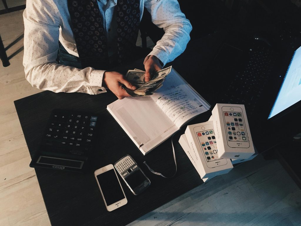 pexels-photo-210990-210990 Accountant Counting Money